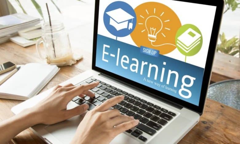 hand typing on computer keyboard with E-learning Education on screen. internet online study concept.